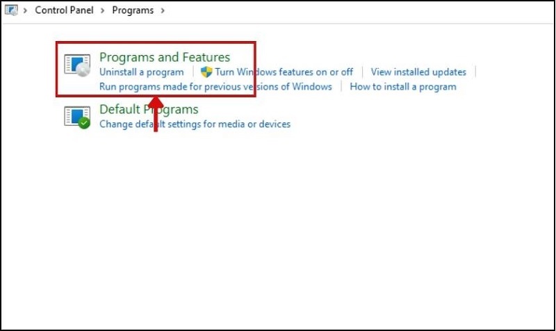 Chọn mục Programs and Features