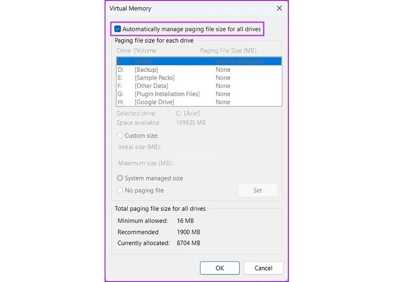 Bỏ tích ở tùy chọn Automatically manage paging file size for all drives
